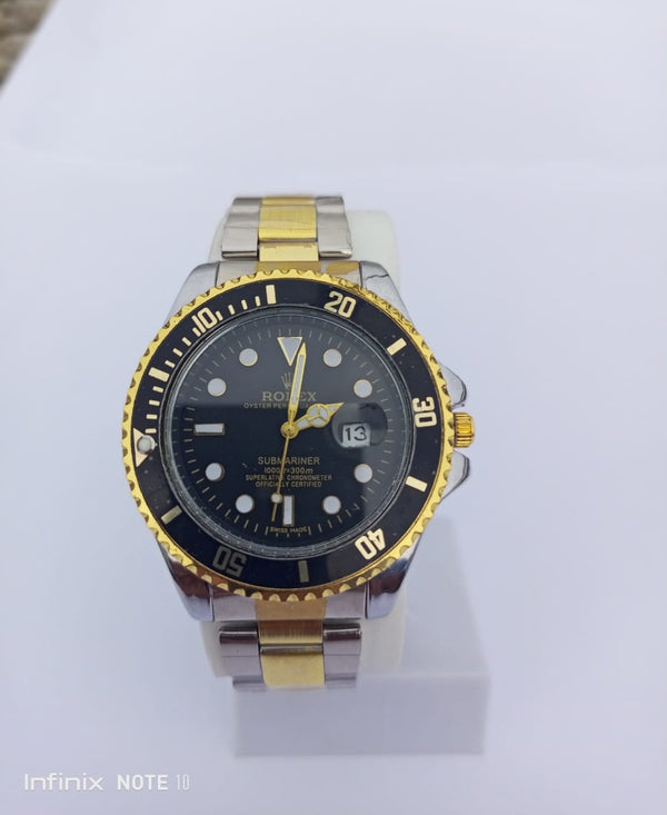 Rolex Submariner gold with whit rotating dial